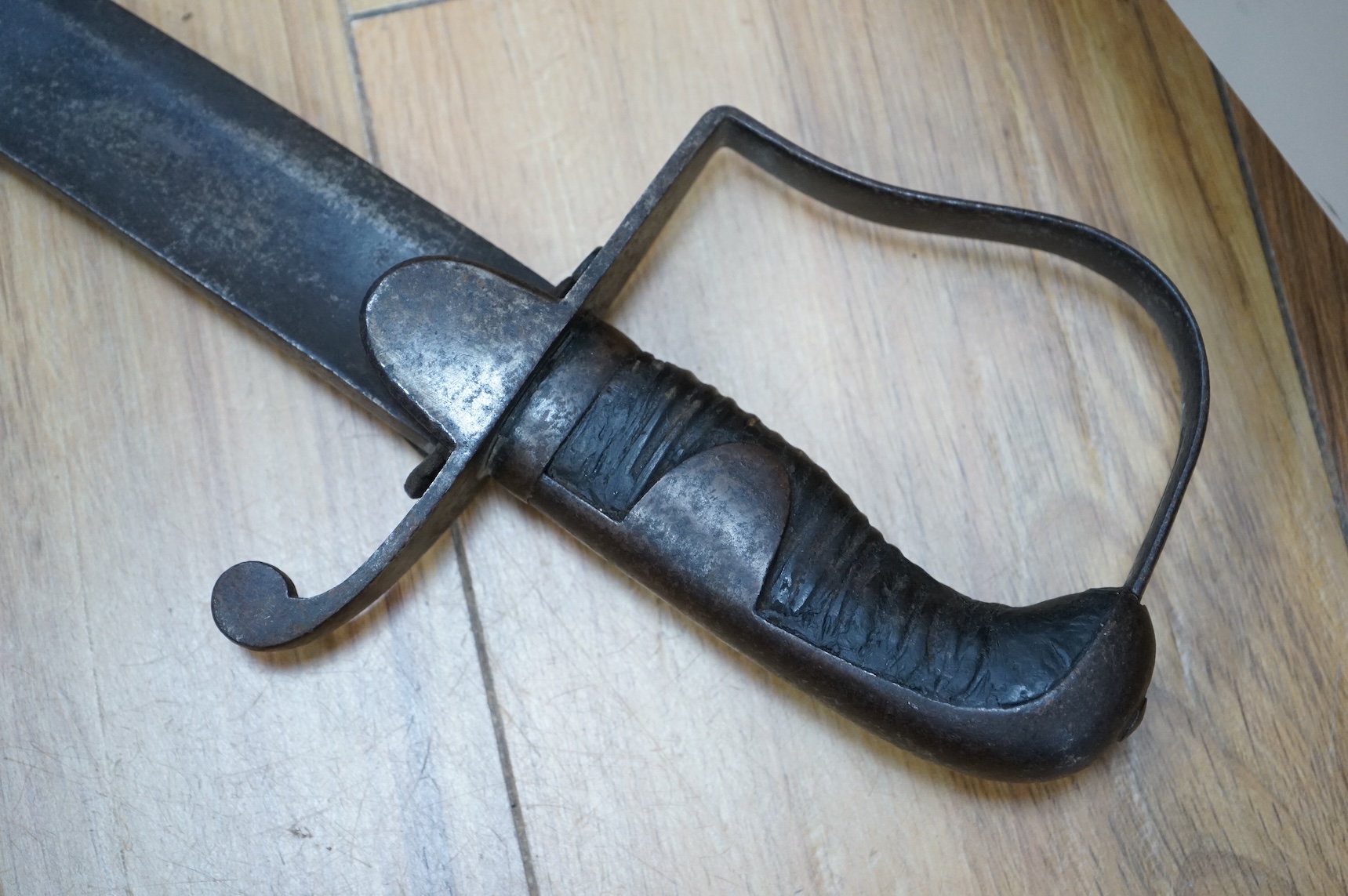 Two swords; a 1796 pattern cavalry troopers regulation pattern sword, the blade stamped W. Deakin, with government inspector’s mark, and regulation hilt, in fair condition, well worn with some light pitting, together wit